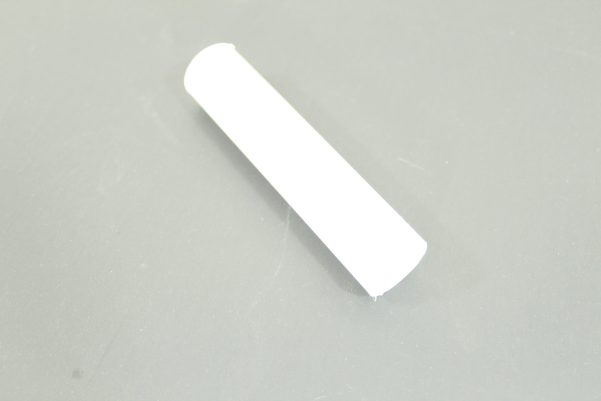 Plastic Candle Cover. Specifications include: 4" High, 3/4" Inside Diameter, Fits over Candelabra Size Socket, White Plastic.